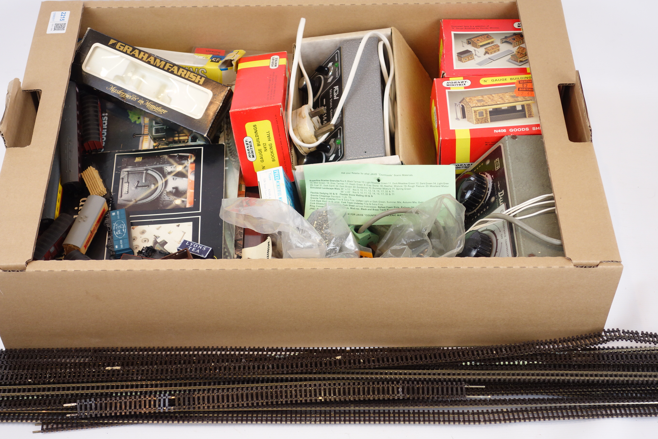Collection of N gauge railway accessories including Buildings, Track