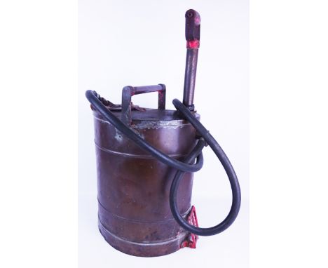 Vintage brass stirrup pump fire hose and water container, H64cm 