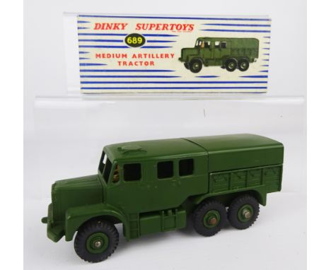 Dinky Supertoys Medium Artillery Tractor, 689, including spare tyres, in blue & white box,    Condition Report  Model: G/EX ,