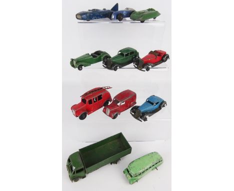 Collection of unboxed Dinky die cast vehicles including: Streamlined Fire Engine 25H, Streamlined Bus, 29B, Streamline Race C