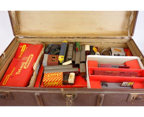 Collection of Triang Railways 00 gauge track including boxed, rolling stock, transformers, figures and accessories in trunk