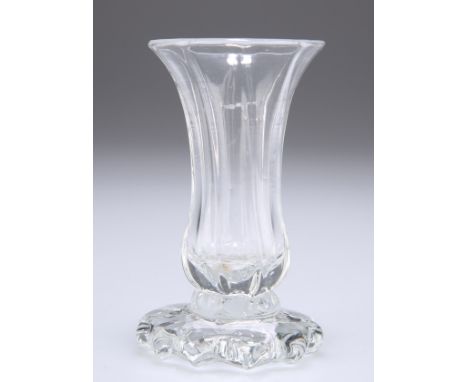 A DUTCH GIN DRAM GLASS, the bowl elongated and panel cut and with a flared rim, all set on a 'ruff' and a domed petal foot wi