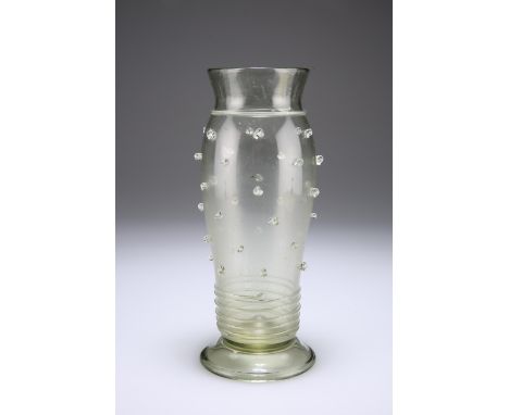 A BOHEMIAN LIGHT GREEN VASE, CIRCA 1760,&nbsp;the tapering body nipped in at the shoulder to a straight lip, prunts applied t