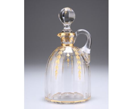 A BACCARAT DECANTER AND STOPPER, CIRCA 1900,&nbsp;decorated with gilding of leaves and fronds, the tapering body with twelve 