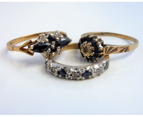 Three sapphire and diamond hallmarked 9-carat yellow-gold rings; one designed as a cluster, size M, the second as a seven sto