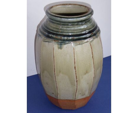 Richard BATTERHAM (b. 1936); a large Studio-ware style stoneware jar of faceted barrel form, green glazes and with natural st