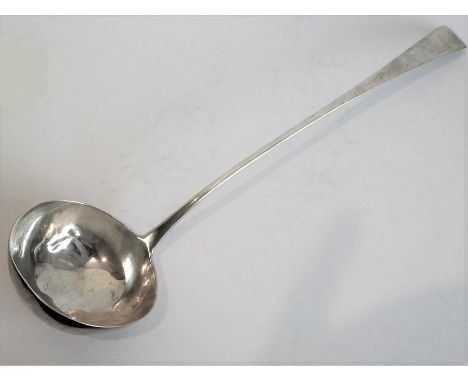 An 18th century hallmarked silver ladle; Old English pattern with engraved armorial to the terminal and circular bowl (some d