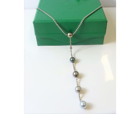 An 18-carat white-gold cultured pearl and diamond-set necklace by Boodle & Dunthorne, the 18-carat spherical bead necklace su