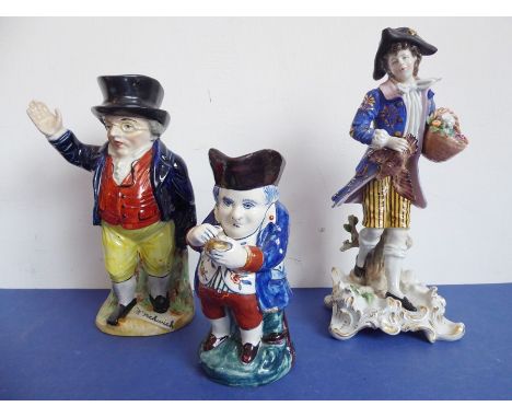 A 19th century Staffordshire jug modelled as 'Mr Pickwick', a smaller Continental tin-glazed earthenware Toby jug (damaged an