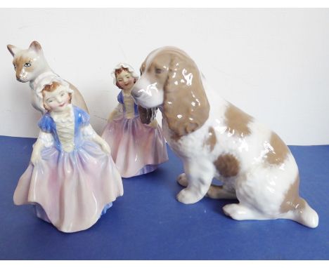Four decorative ceramic figures; two Royal Doulton 'Dinky Do' figures (HN1678), a Royal Copenhagen porcelain model of a long-