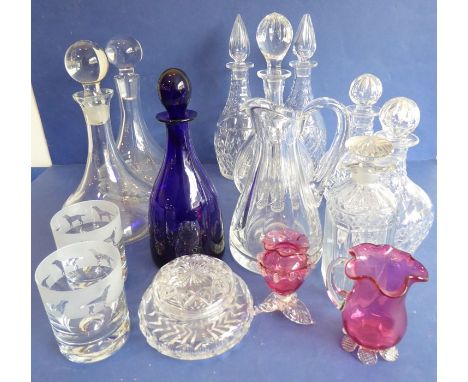 A very good selection of nine decanters and other glassware: two ships' decanters, a pair of mallet-shaped cut-glass decanter