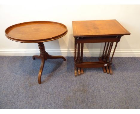 A George III style&nbsp;(probably 19th century)&nbsp;oval tilt-top mahogany occasional table, bobbin-turned stem and three do