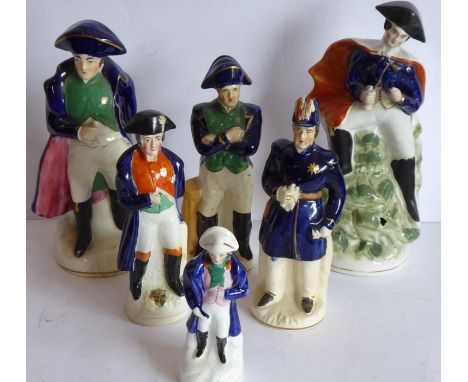 Six varying sized hand-decorated Staffordshire figure models of Napoleon (the tallest (with hole to green rockwork in front) 