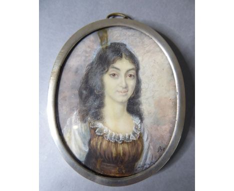 A well-executed framed and glazed portrait miniature of a young woman