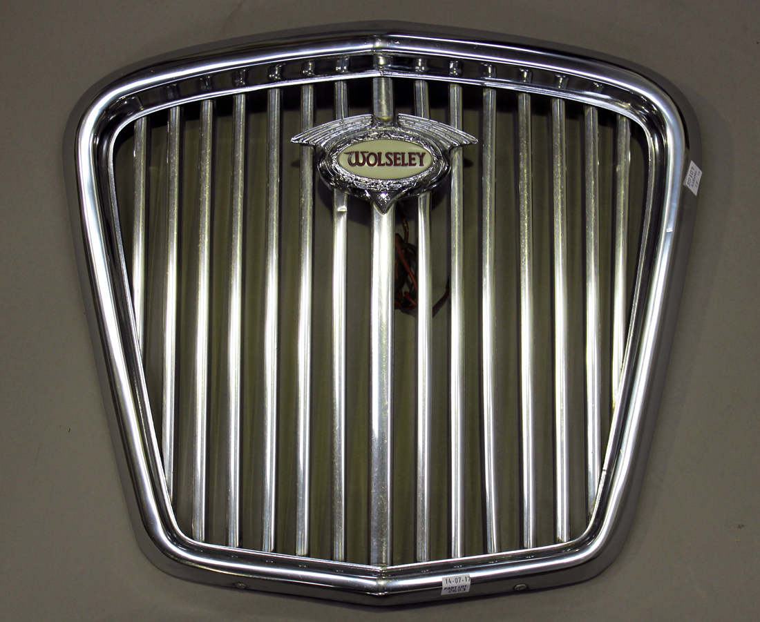A collection of radiator badges, including Austin Healey, 4.4