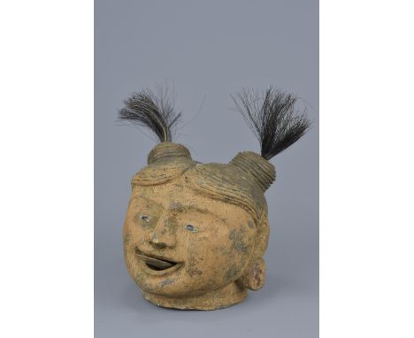 A vintage wooden puppet head with movable tongue on a string pulley.&nbsp;16cm height