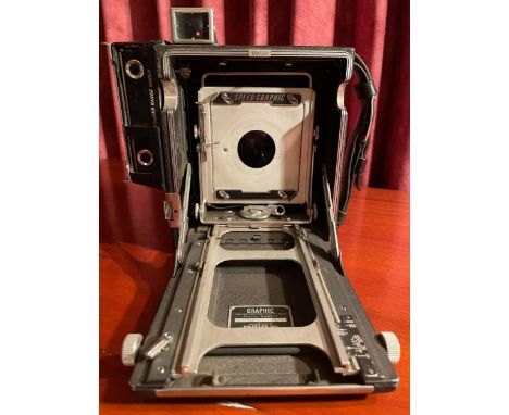 GRAFLEX Speed Graphic 3.25 x 4.25 inchNo lens plate or lens.  Includes metal hood.  Glass plate size 4 inches x 3.25 inches (