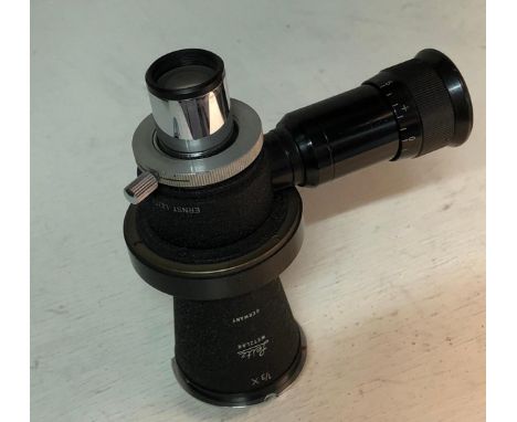 LEITZ MIKAS  (micro ibso) Used to attach a camera to a microscopeGeorge Furst:I have used this microscope attachment a great 