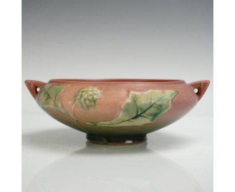 Roseville Pottery bowl in the Thornapple pattern, shape 307-6, featuring raised thornapple blossoms in soft white against a b