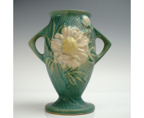 Roseville Pottery vase in the Peony pattern, decorated with bold raised white and yellow-centered peony blossoms on both side