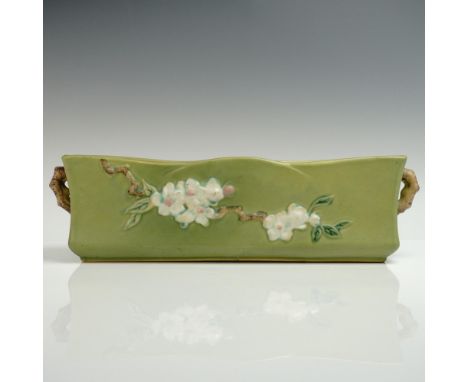 Of rectangular form, this pottery planter features irregular leafy apple branches with clusters of white blossoms on a green 