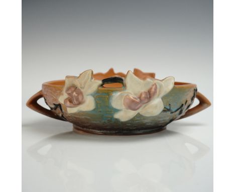 Roseville Pottery bowl in the Magnolia pattern, model 448-6, featuring sculptural magnolia blossoms in cream and mauve-pink w