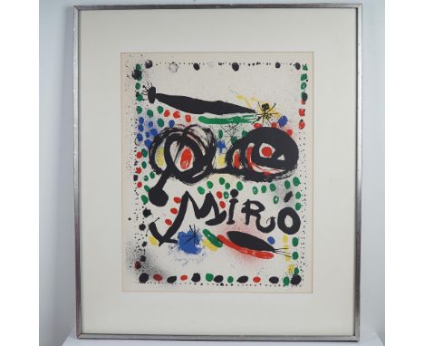 Joan Miro vibrant lithograph featuring bold black forms, colorful splashes, and playful abstract shapes, prominently displayi