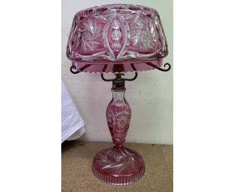 A flash glass table lamp with glass shade and glass baluster column ad spreading foot CONDITION REPORT: minor chips to the fo