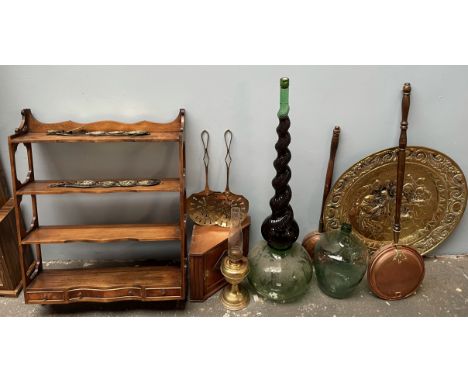 Brass milk skimming ladles together with glass bottles, copper bed warming pans, a bottle of Chianti, a hanging wall shelf, b
