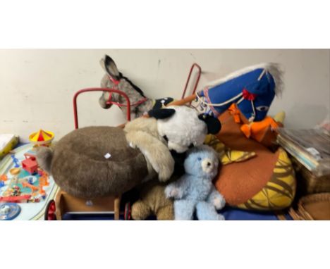 A mobo trolley, push along donkey, Corgi Magic roundabout and other toys