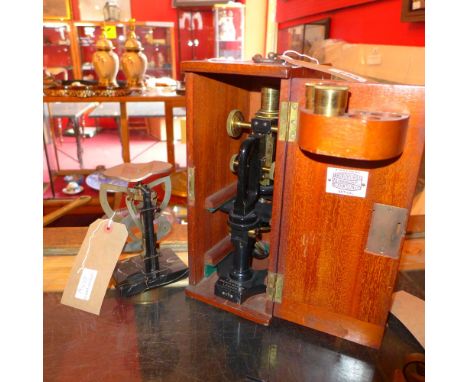 A mahogany cased microscope from Broadhurst Clarkson & Co together with a set of scales 