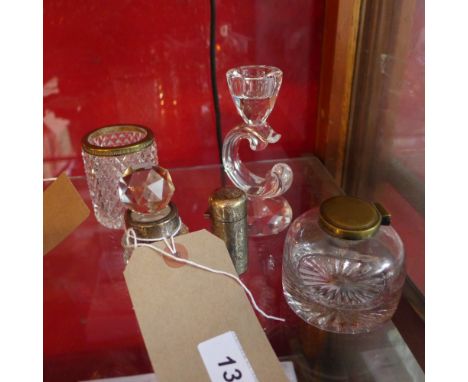 A Victorian hallmarked silver perfume bottle together with a glass and silver collared perfume bottle, a glass inkwell, a Swa