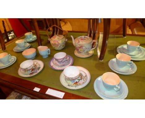 A Carlton Ware, blush ivory teapot on stand together with a collection of other tea wares 