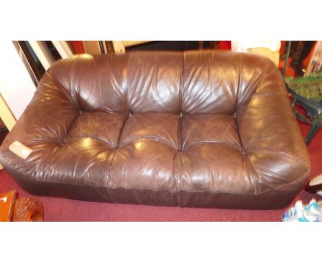 An early Ligne Roset two seater leather sofa 
