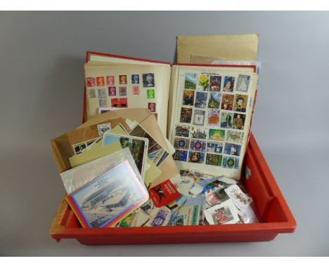 A Box Containing Stamp Album, First Day Covers, Loose Stamps etc