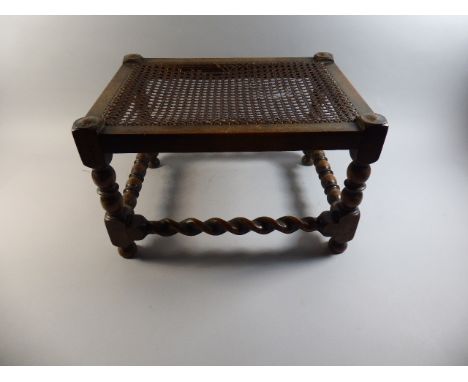 An Oak Rectangular Cane Seated Stool with Barley Twist and Bobbin Stretchers, 45cm Long  