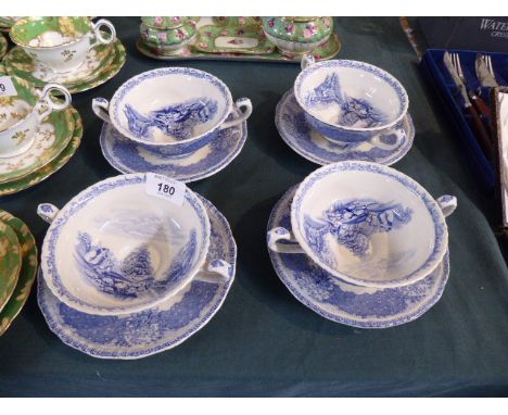 A Set of Four Blue and White Royal Doulton Soup Bowls and Saucers 