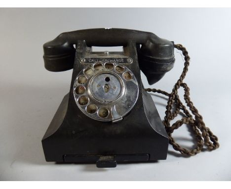 A Vintage Bakelite Telephone with Base Number Drawer and Call Exchange Button 