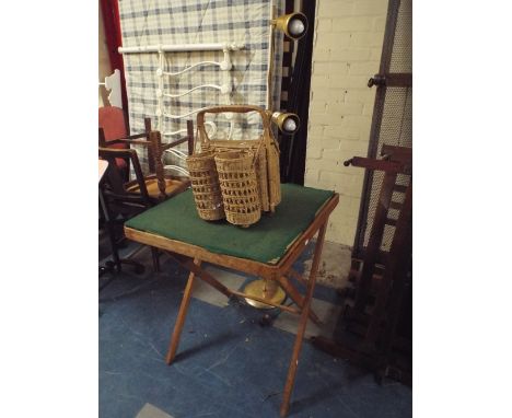 A Brass Two Branch Reading Lamp, Wicker Bottle Carrier and Folding Beize Table 