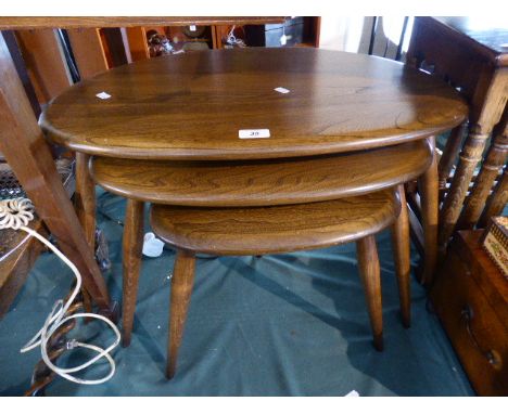 An Ercol Nest of Three Oval Topped Tables 