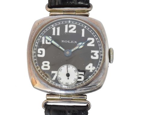 A 1920s silver Rolex wristwatch,  A 1920s silver Rolex wristwatch, the black circular signed dial with arabic markers, subsid