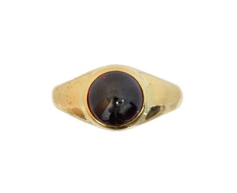 A garnet dress ring, A garnet dress ring, the circular garnet cabochon inset to the polished band, ring size J1/2, gross weig