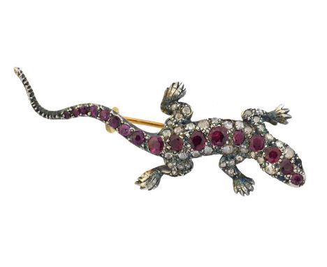 A ruby and diamond brooch, A ruby and diamond brooch, designed as a lizard with circuar shape ruby and rose cut diamond body,