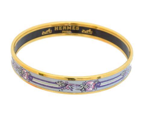 A Hermès enamel bangle bracelet, A Hermès enamel bangle bracelet, the vari-shade enamel bangle with floral decoration, signed