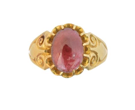 A late Victorian 18ct gold garnet dress ring, A late Victorian 18ct gold garnet dress ring, the oval garnet cabochon with scr