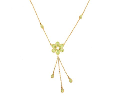 An 18ct gold peridot necklace, An 18ct gold peridot necklace, the pear shape peridot cluster suspending three vari-level peri