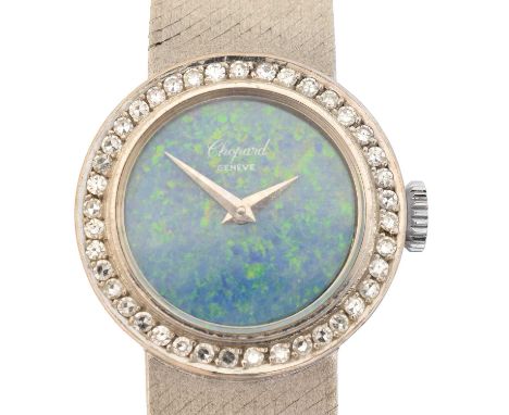 An 18ct gold Chopard wristwatch, An 18ct gold Chopard wristwatch, cal. 2412, the signed opal dial with tapered hands, signed 