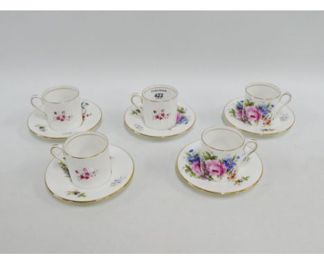 Set of five Aynsley floral patterned coffee cans and saucers, (5) 