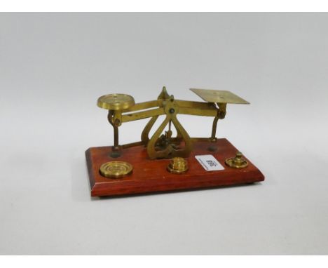 Set of postage scales and weights