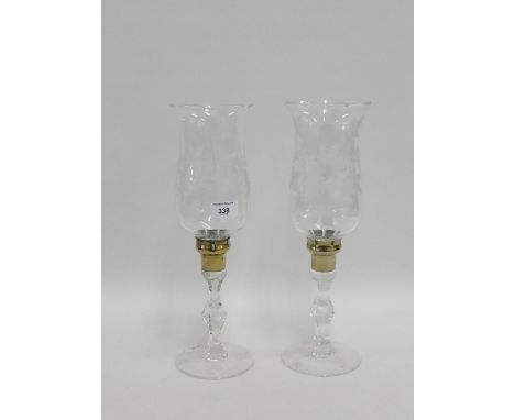 Pair of etched glass storm light/candlesticks with knop stems on circular foot rims, 37cm high, (2) 